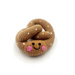 PEBBLE PRETZLE RATTLE